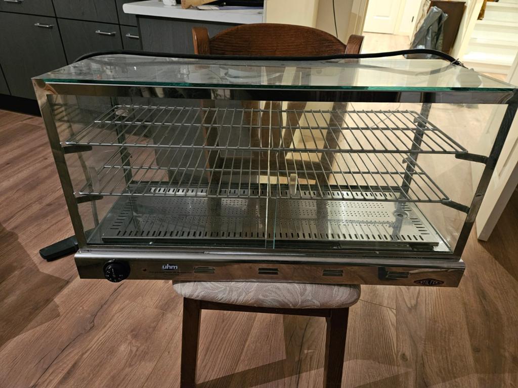 Warmhoud vitrine, Ophalen