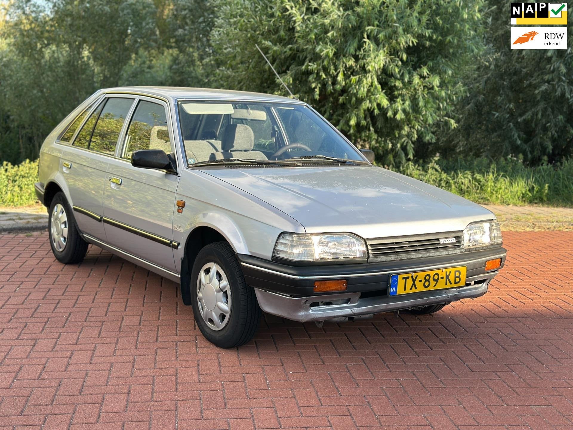 Mazda 323 1.3 LX Automaat/Nap, Gebruikt, 4 cilinders, 400 kg, Bedrijf