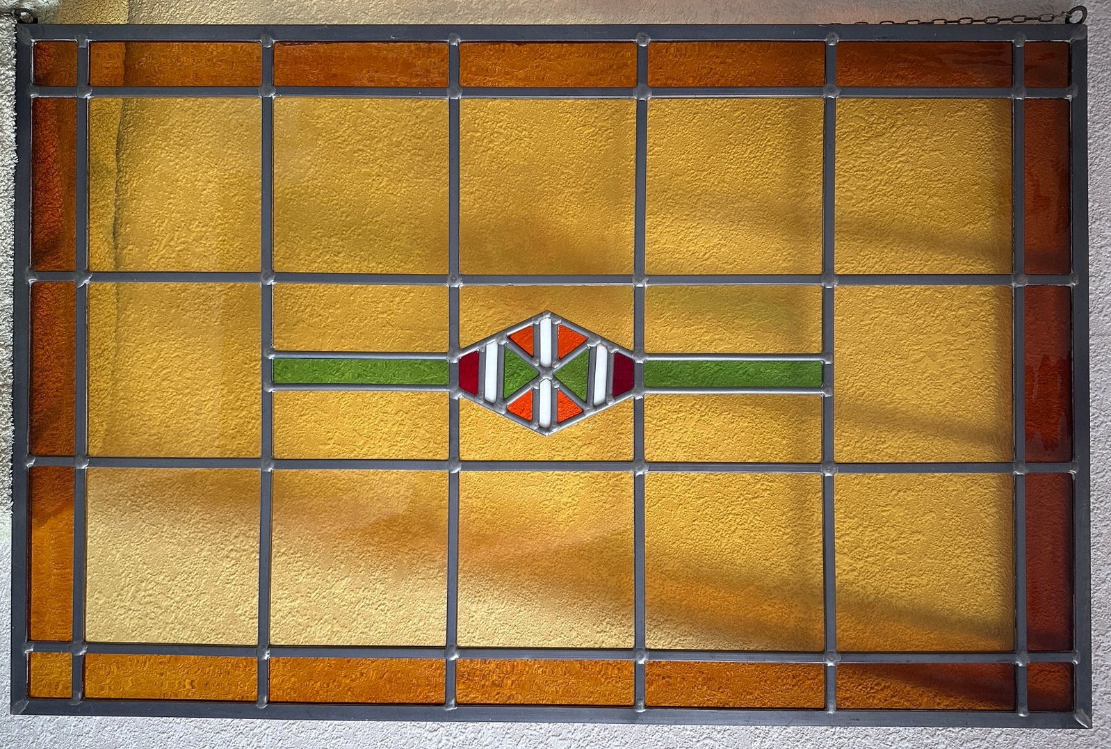 Glas in lood panelen met logo van Enschede, Ophalen