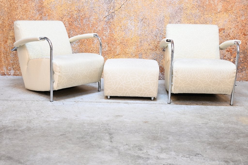 ZGANieuw 2 cremekleurige Leolux Scylla fauteuils + poef