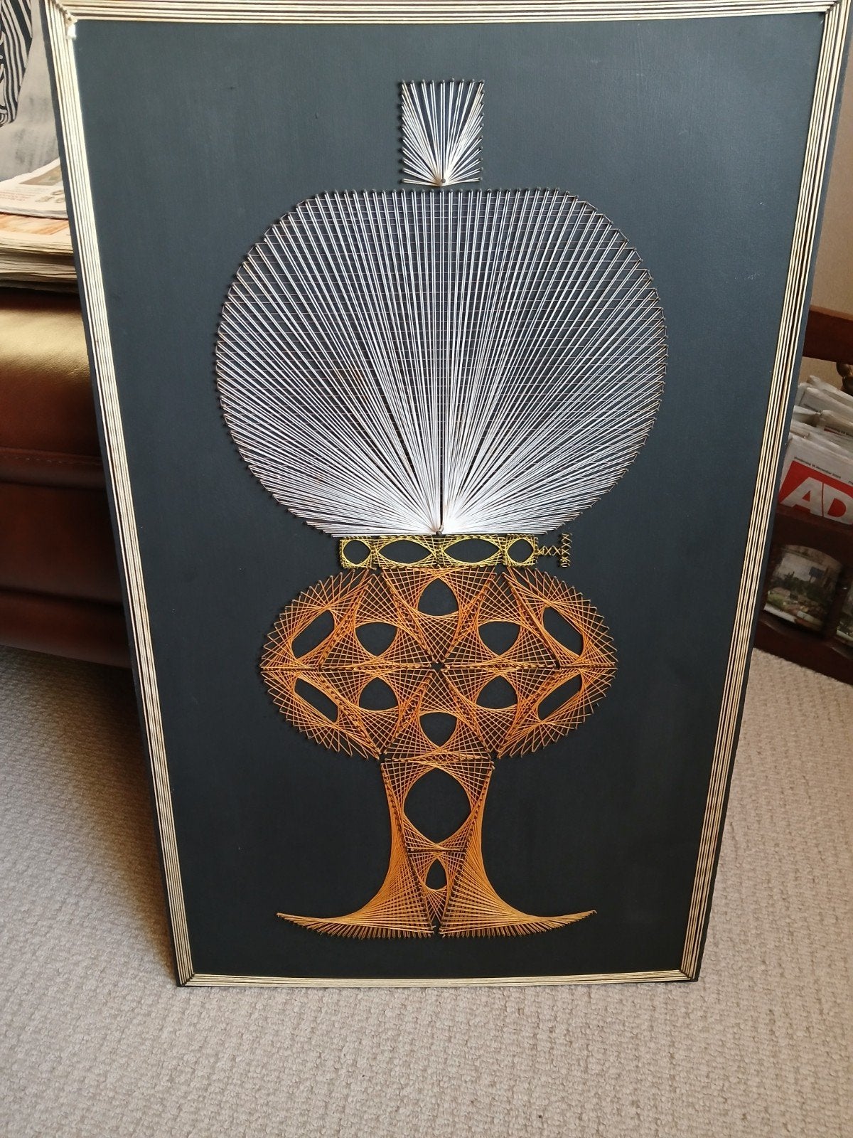 Vintage geometrische string, Ophalen