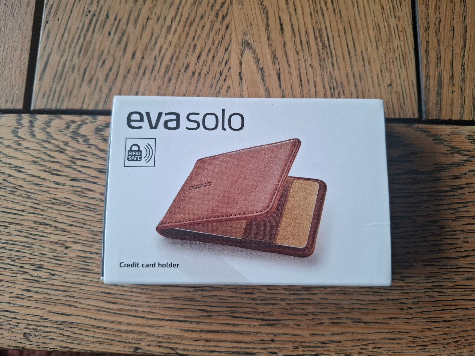 Nieuwe Eva Solo cognac bruine leren kredietkaarthouder., Ophalen of Verzenden, Nieuw, Bruin
