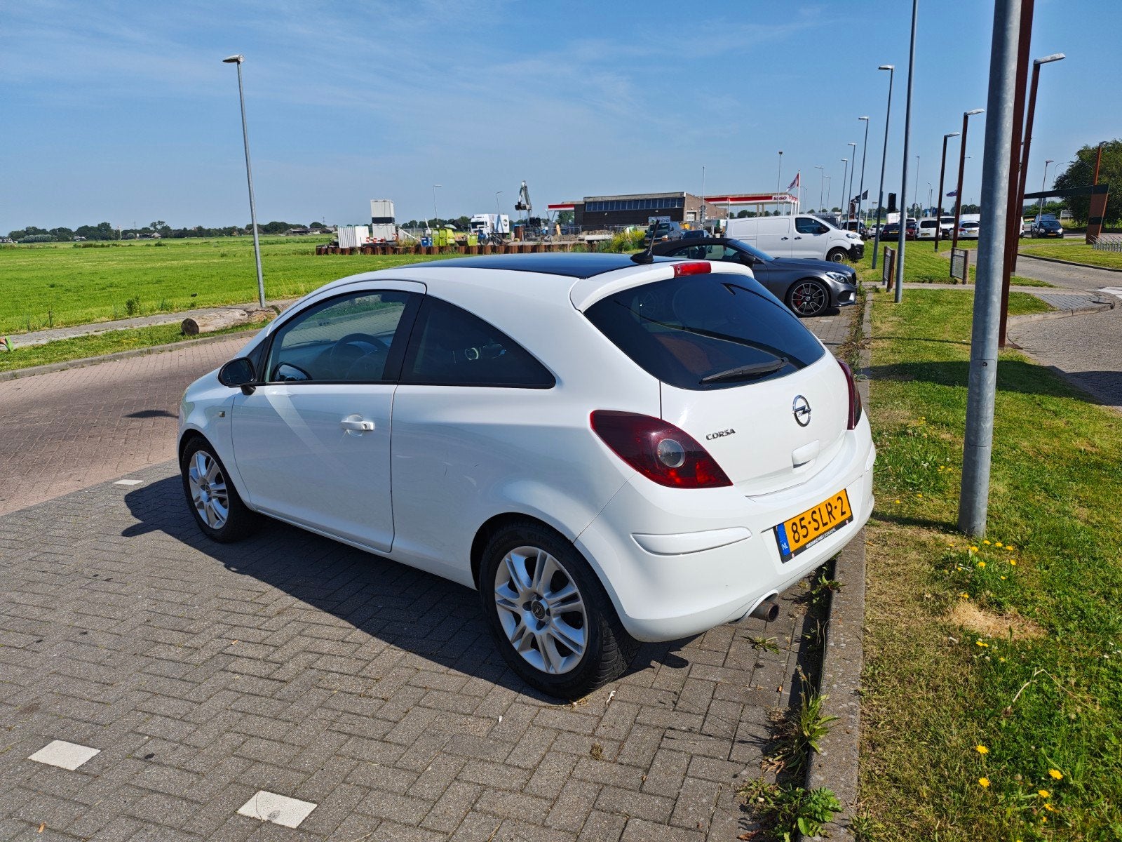 Opel Corsa 1.2 16V LPG 3D 2011 Wit, Auto's, Opel, Voorwielaandrijving, 83 pk, 4 cilinders, 1229 cc