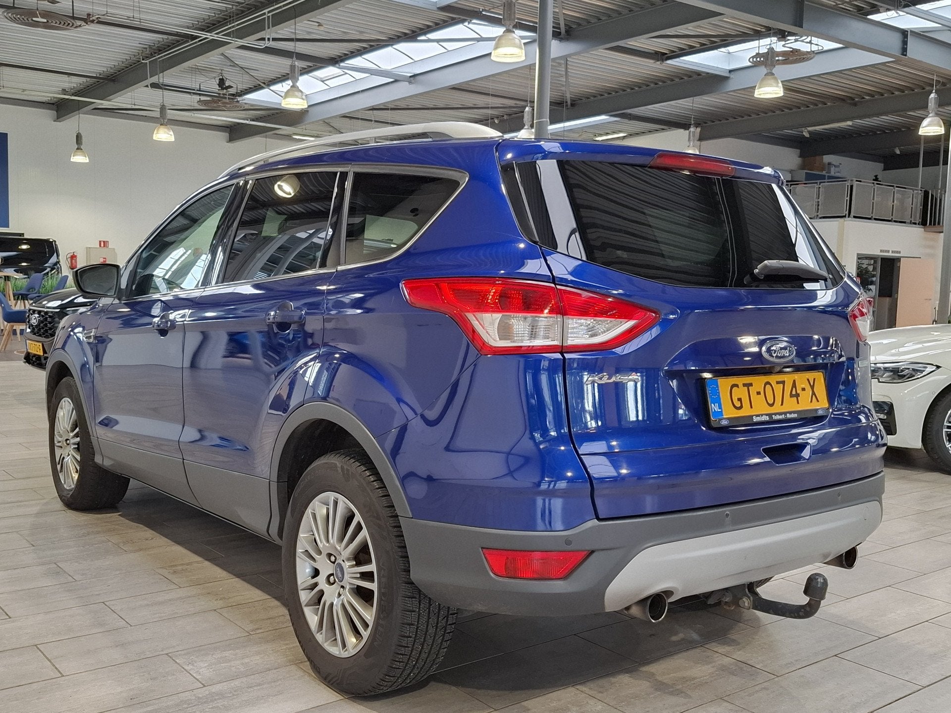 Ford Kuga 1.6 Titanium 183 pk Plus 4WD | Trekhaak | Pano | C, Auto's, Gebruikt, Zwart, 4 cilinders, Blauw