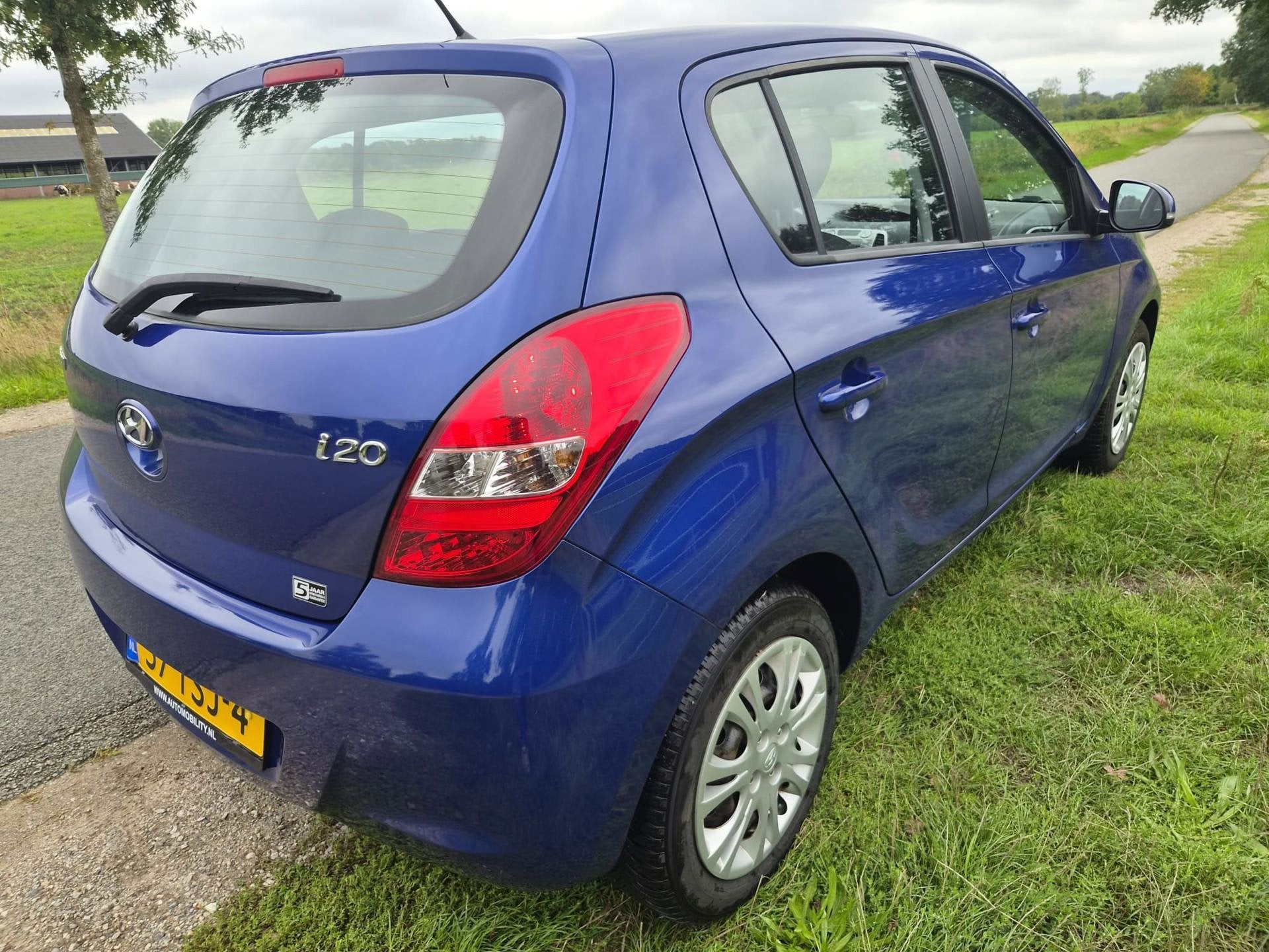 Hyundai I20 1.2i i-Motion dealer ond. pas 67.000km, Gebruikt, 31 €/maand, 4 cilinders, Blauw