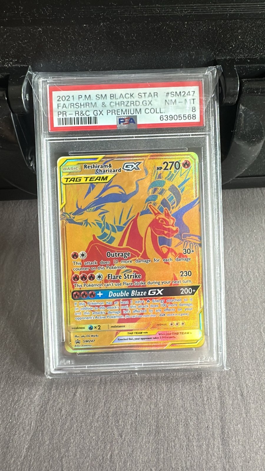 Pokémon Reshiram & Charizard GX TAG TEAM (SM247) PSA 8, Ophalen of Verzenden, Gebruikt, Losse kaart, Foil
