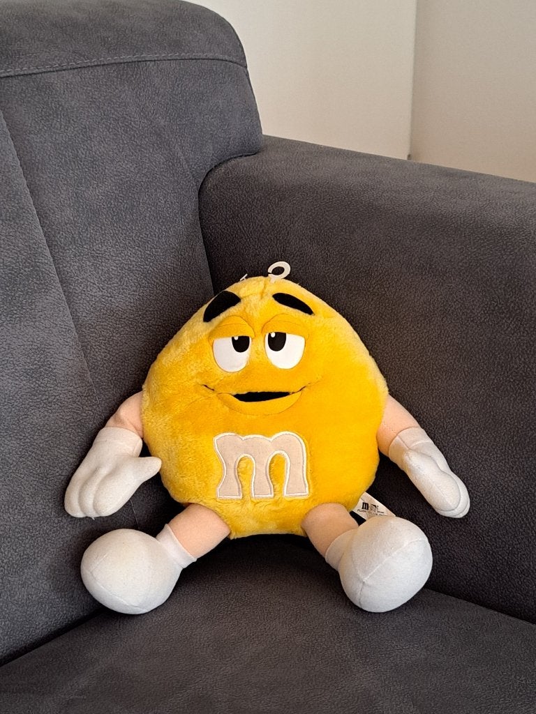 M&M's Yellow pluche 1998 D19xB10cm, copyright Mars, Ophalen of Verzenden, Gebruikt, Overige typen