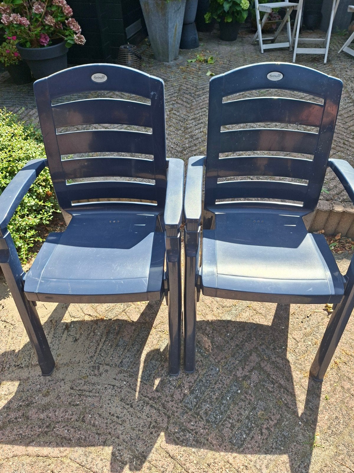 2x Hartman tuinstoelen, stapelbaar, donkerblauw, Ophalen of Verzenden, Gebruikt, Kunststof, Stapelbaar