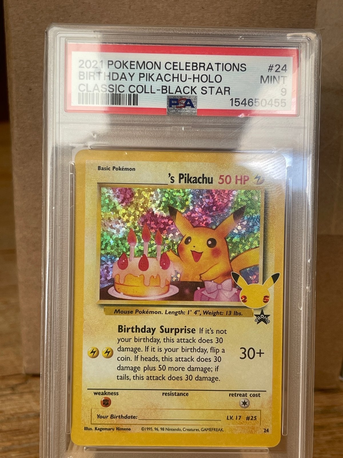 PSA 9 MINT Birthday Pikachu Holo 2021 Celebrations Pokémon K, Ophalen of Verzenden, Zo goed als nieuw, Losse kaart, Foil