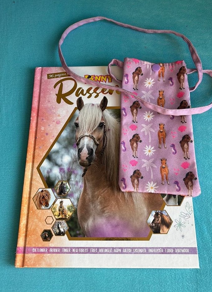 Penny Rassenboek + gratis telefoontasje, Ophalen of Verzenden, Zo goed als nieuw