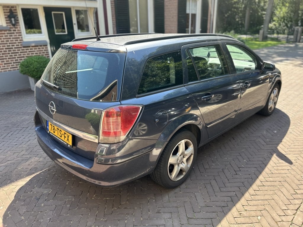 Opel Astra Wagon 1.6 Edition Handel / Export (bj 2007), Gebruikt, 4 cilinders, Metallic lak, Origineel Nederlands