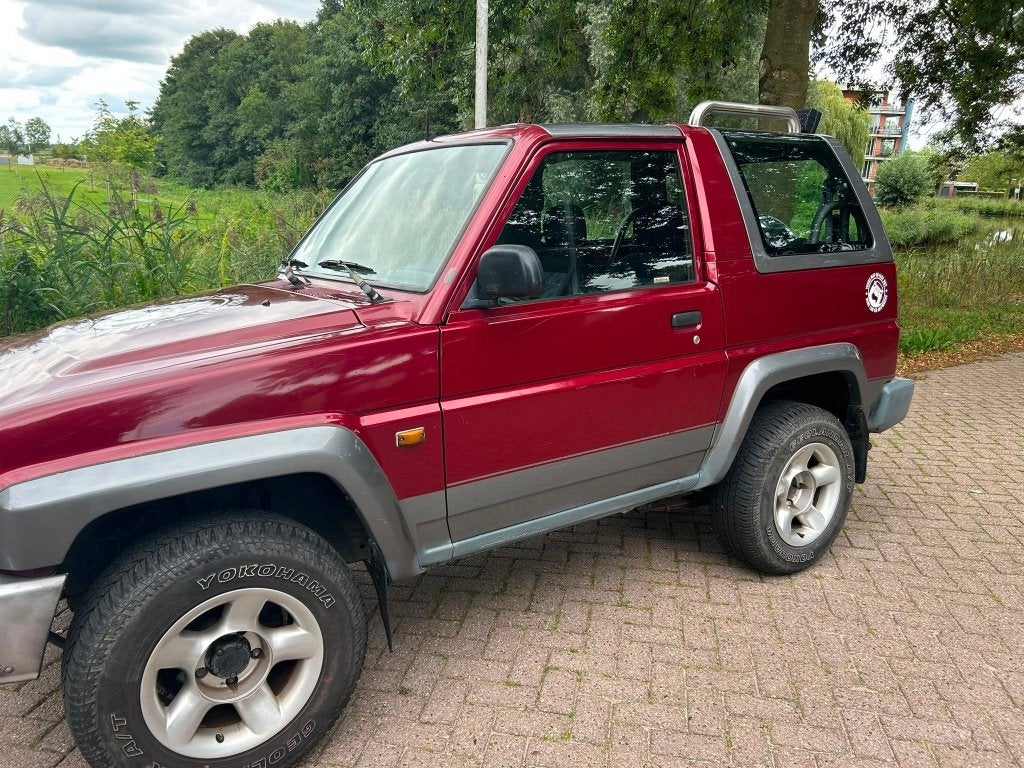 Daihatsu Feroza 1.6 I Resintop 4WD 1997 Rood, Auto's, Feroza, 1590 cc, Origineel Nederlands, Handgeschakeld