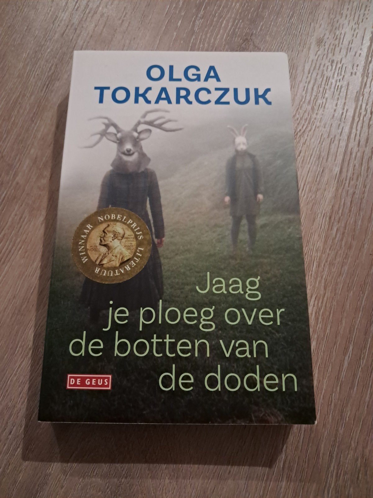 Olga Tokarczuk - Jaag je ploeg over de botten van de doden, Europa overig, Verzenden, Olga Tokarczuk, Zo goed als nieuw