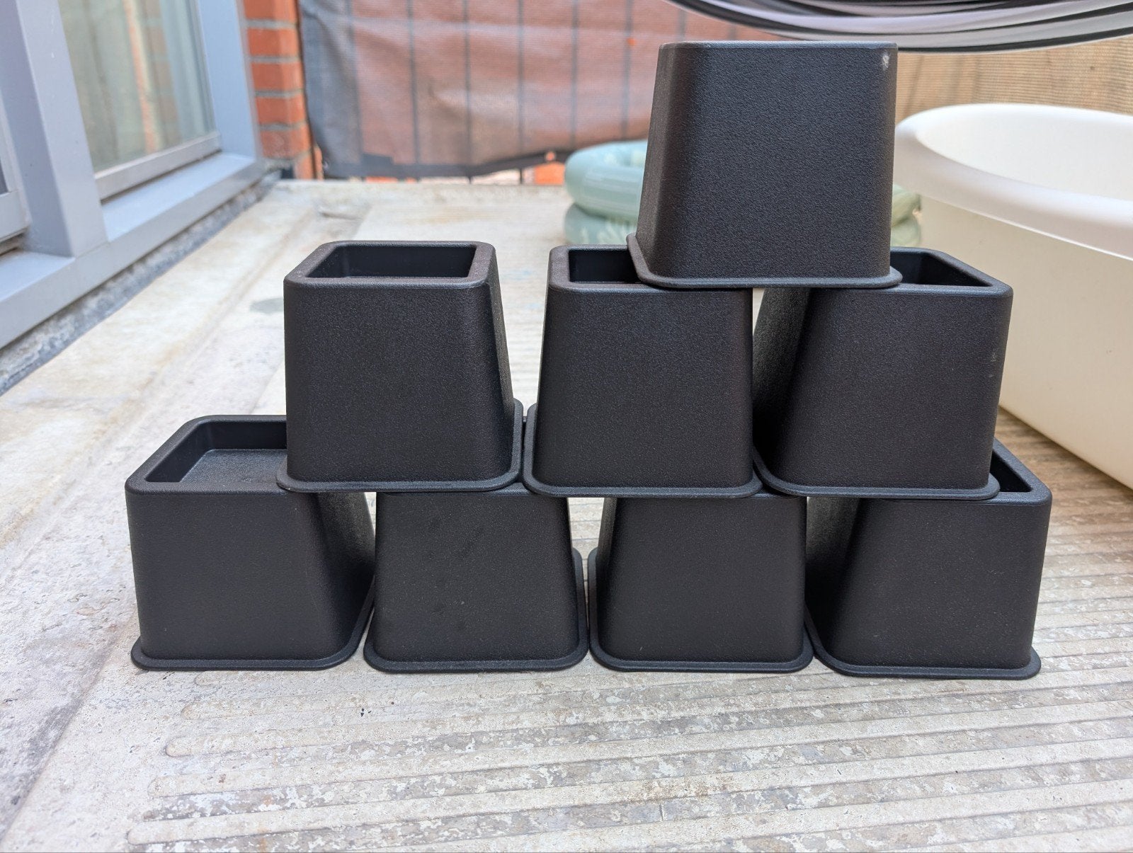 Verhogers voor meubels of bed - Zwart, 8 stuks, Ophalen of Verzenden, Gebruikt, Zwart, Kunststof