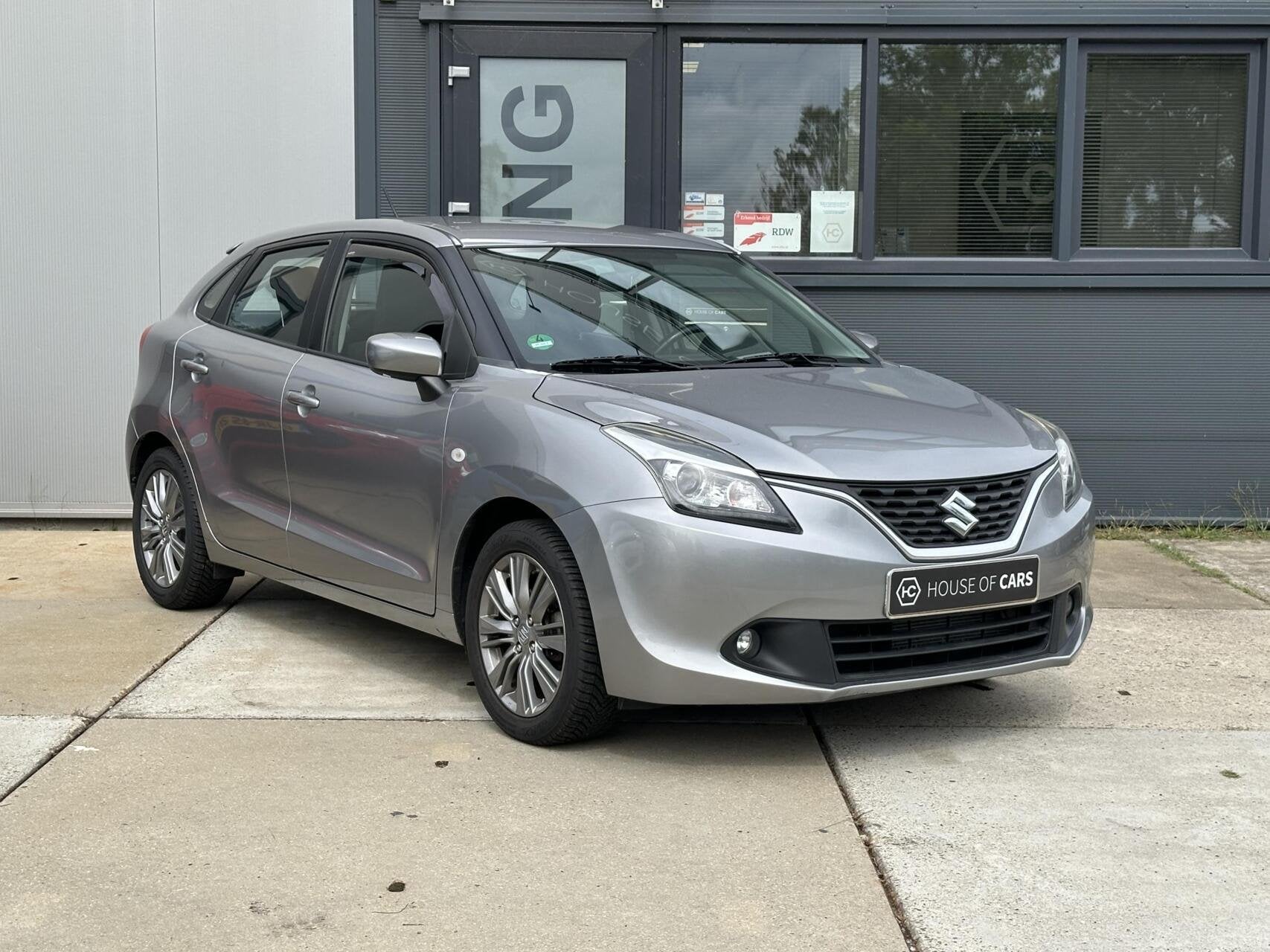 Suzuki Baleno 1.2 Exclusive 5-Deurs Airco Bluetooth Trekhaak, Auto's, Suzuki, Voorwielaandrijving, Stof, Gebruikt, 4 cilinders