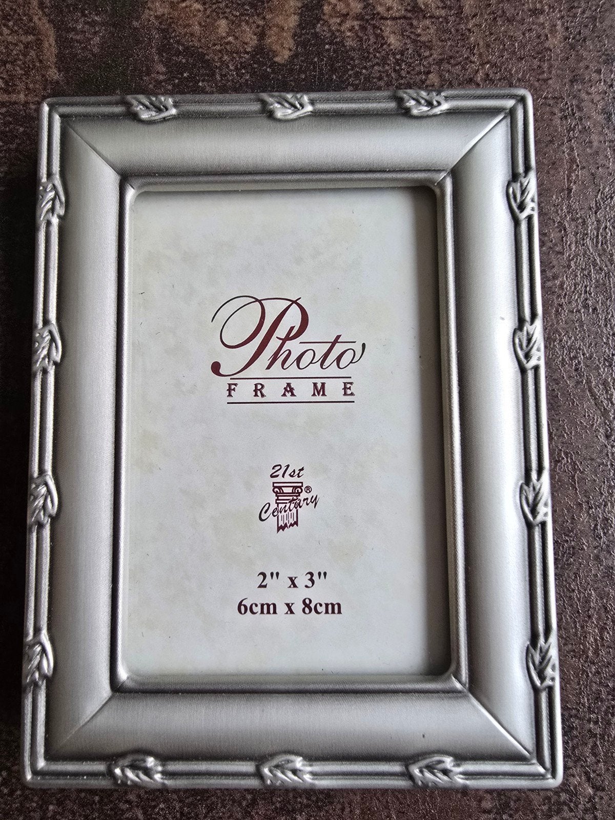 Klassiek zilverkleurig mini-fotolijstje (6x8 cm) – als nieuw, Ophalen of Verzenden, Zo goed als nieuw