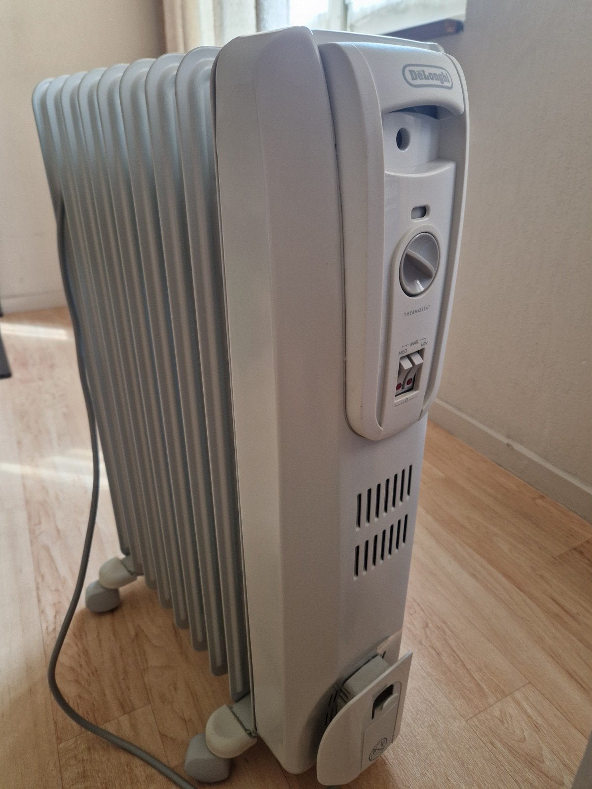 DeLonghi Elektrische Oliegevulde Radiator - 9 Elementen, Ophalen, Radiator, Minder dan 60 cm, Zo goed als nieuw