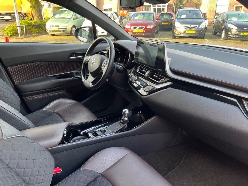 Toyota C-HR 1.8 HYBRID EXECUTIVE / NAVI / CAMERA / DAB / STO, Auto's, Euro 6, 4 cilinders, 98 pk, 26 km/l