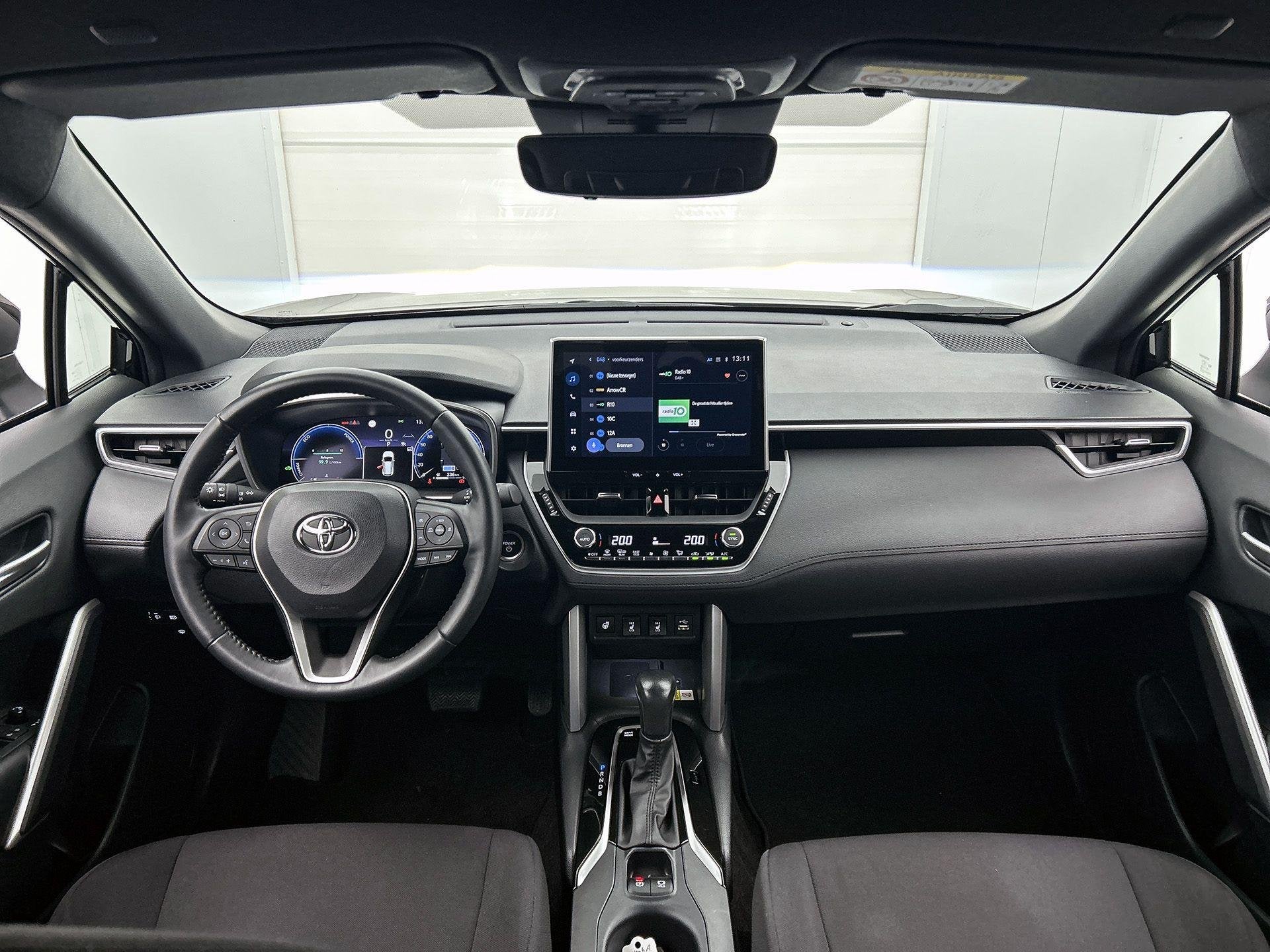 Toyota Corolla Cross Hybrid 140 Business Plus | Camera | Aut, Auto's, 12 maanden, Gebruikt, 4 cilinders, Leder en Stof