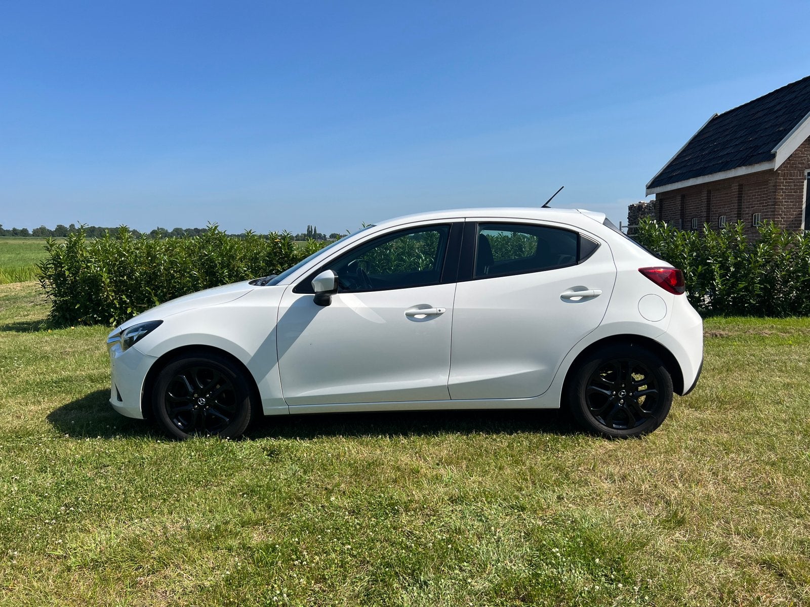 Mazda 2 1.5 Skyactiv-G 90 TS Comfort Pack, Dealeronderhouden, Auto's, Voorwielaandrijving, Stof, 4 cilinders, Wit