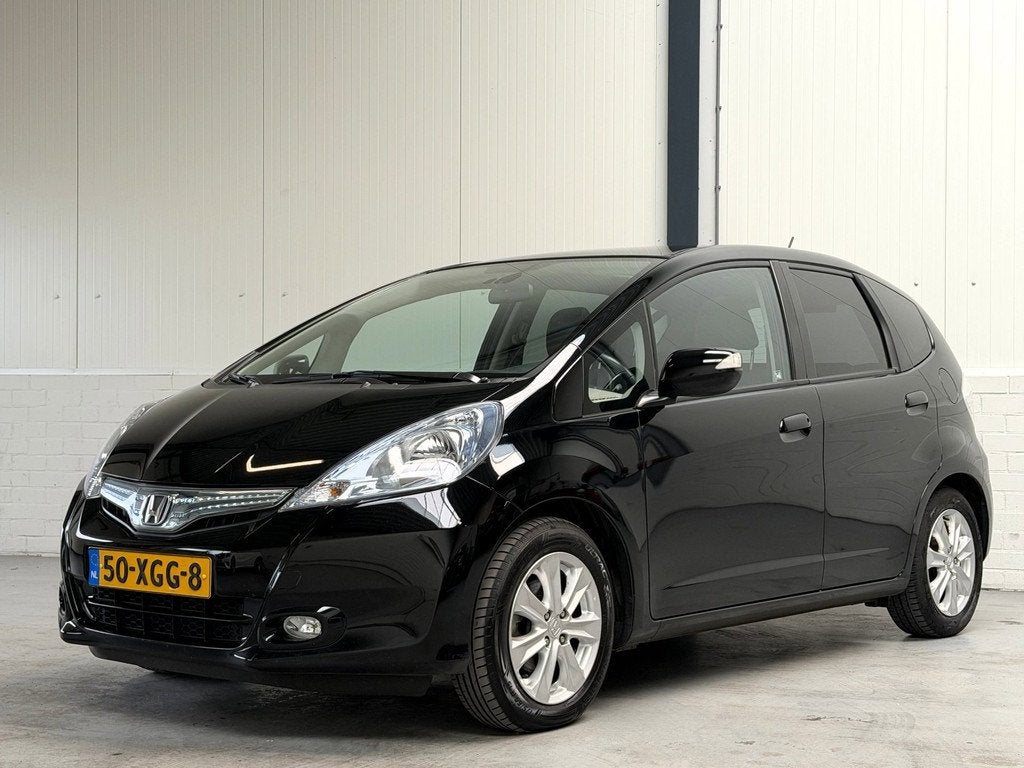 Honda Jazz 1.4 Hybrid Exclusive|Leder|Pano|Stoelverwarming, Auto's, Euro 5, Gebruikt, Zwart, 4 cilinders