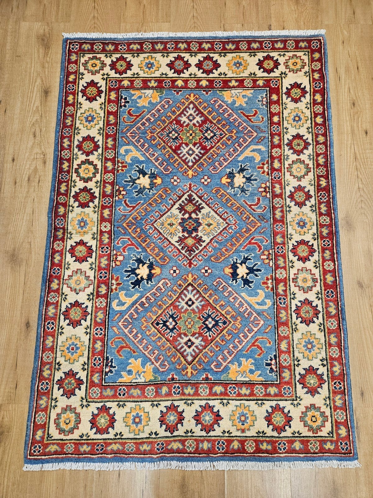 Handgeknoopt oosters tapijt kazak 147x99