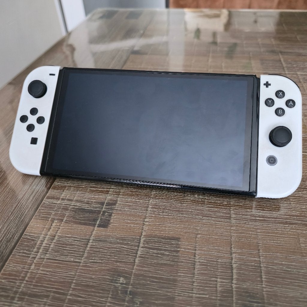 Foto 4 van Nintendo Switch OLED (wit) met veel accessoires