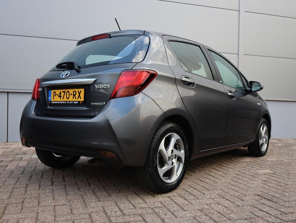 Toyota Yaris 1.5 Hybrid Aspiration Automaat (Vol-Opties!), Auto's, Gebruikt, Euro 6, 4 cilinders, Met garantie (alle)
