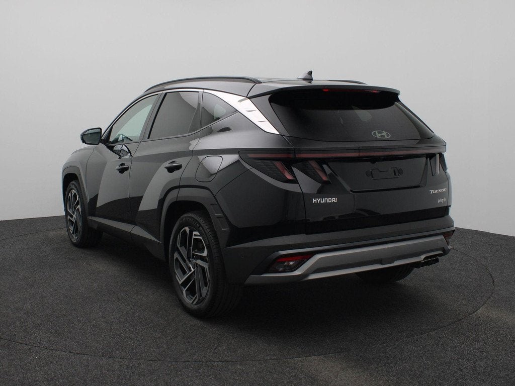 Hyundai Tucson 1.6 T-GDI PHEV Premium | Stoel/ stuur verwarm, Auto's, Hyundai, 238 pk, 4 cilinders, Met garantie (alle), Zwart