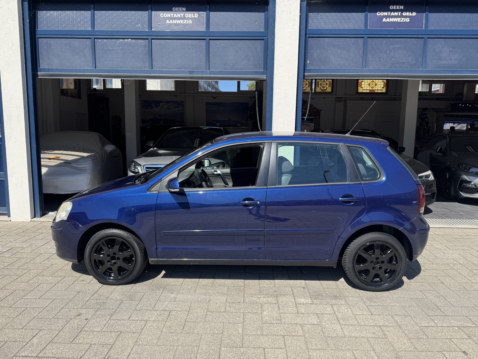 Volkswagen Polo 1.4-16V Turijn AUTOMAAT/AIRCO (bj 2005), Auto's, Elektrische ramen, 4 cilinders, Blauw, Origineel Nederlands