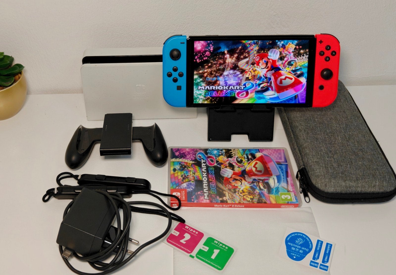 Nintendo Switch OLED met Mario Kart 8 Deluxe, Racen en Vliegen, Ophalen of Verzenden, Zo goed als nieuw, 3 spelers of meer