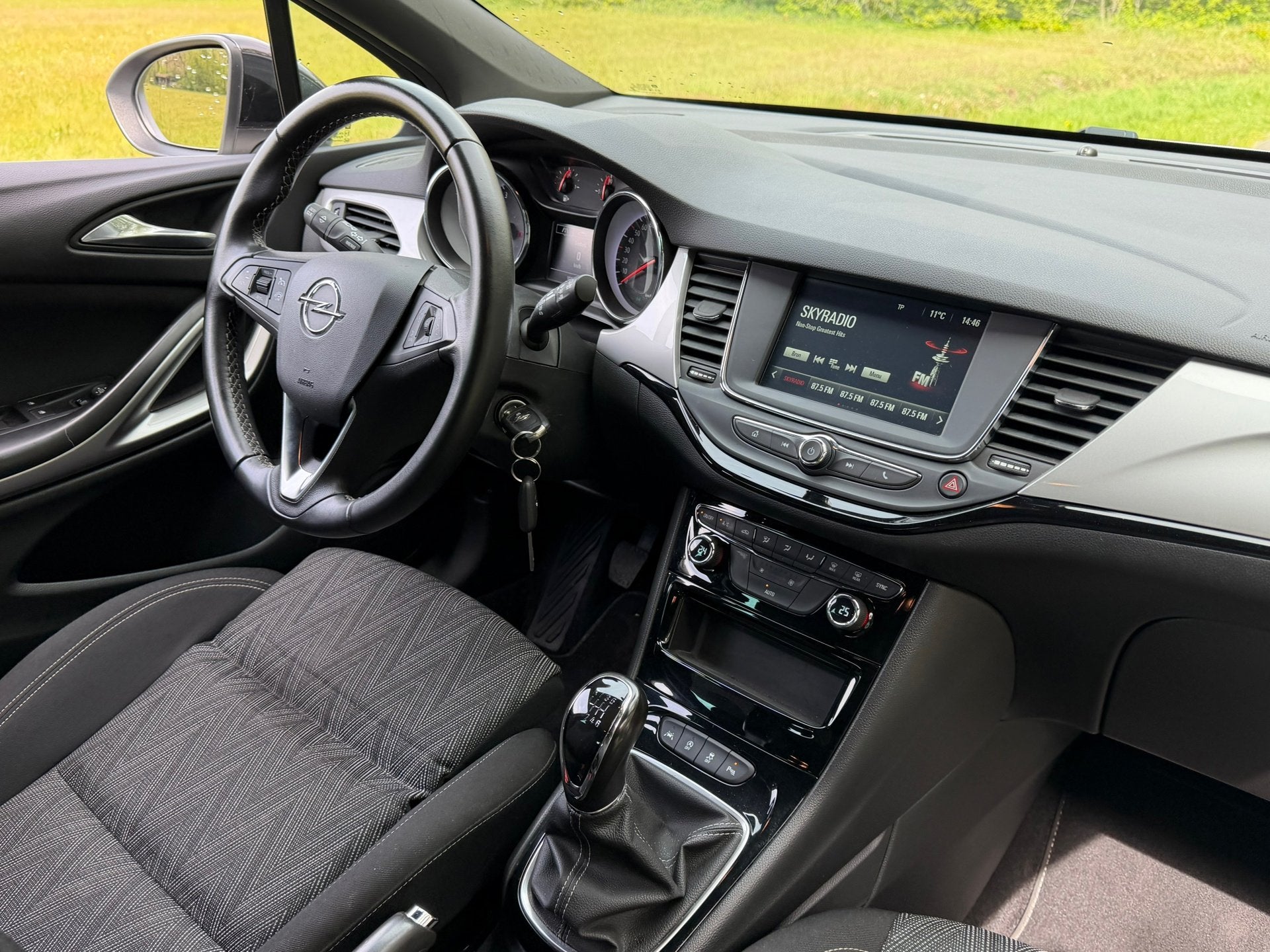 Opel Astra Sports Tourer 1.2 Edition 2020 | Cruise + Clima +, Voorwielaandrijving, Dealer onderhouden, Stof, 1199 cc