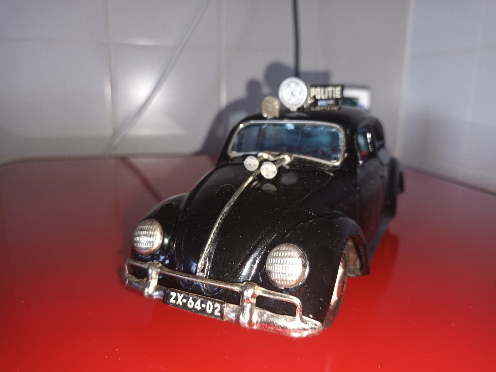 Blikken speelgoed Volkswagen kever 1960 Politie Bandai japan, Antiek en Kunst, Antiek | Speelgoed, Ophalen of Verzenden
