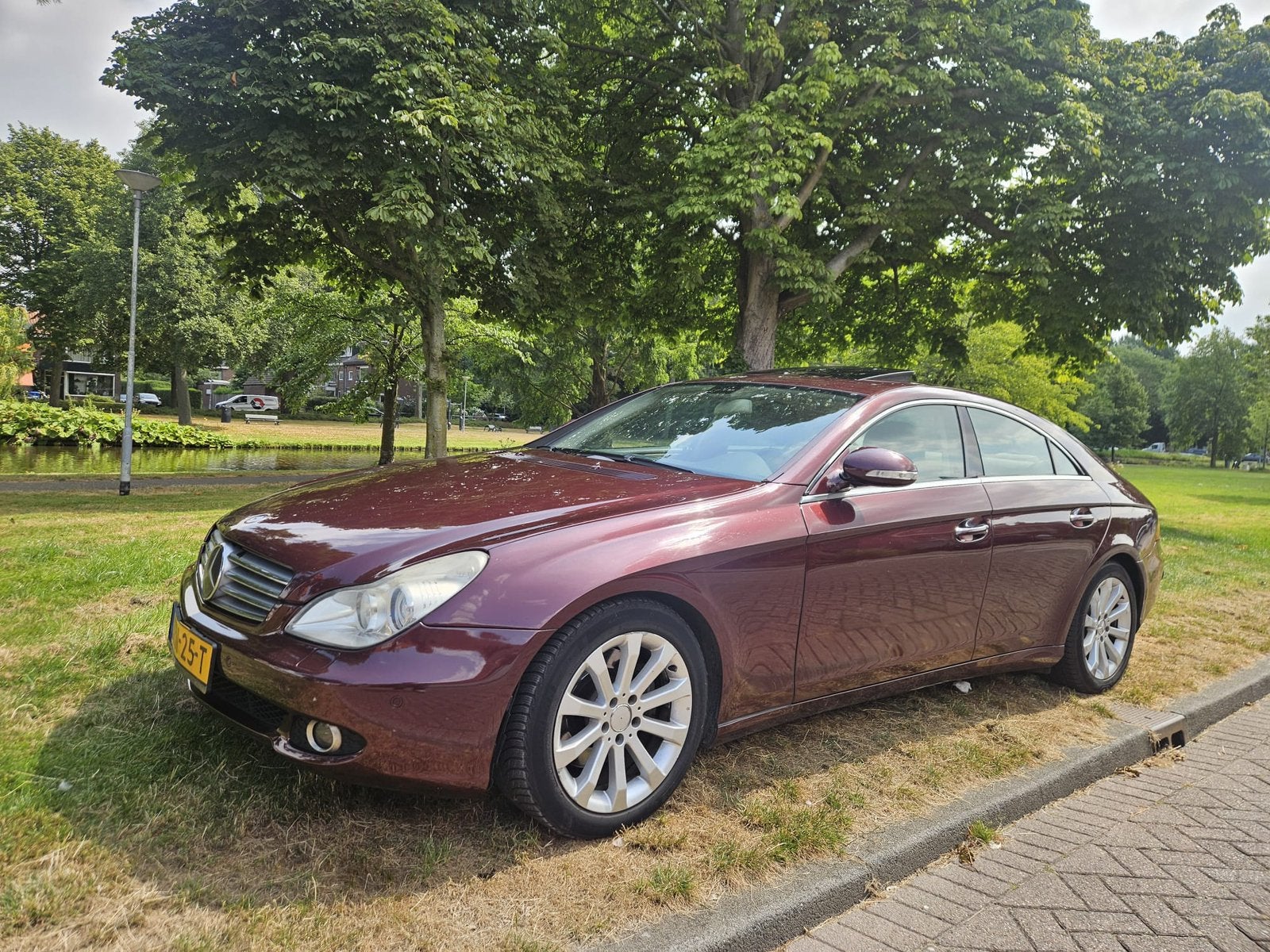 Mercedes-Benz CLS 3.5 Cls350 AUT 2006 Rood, Auto's, Automaat, Achterwielaandrijving, 4 stoelen, CLS