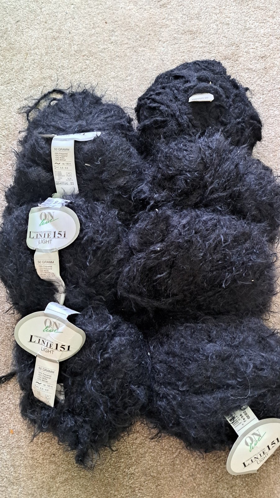 8 bollen Linie 151 Light zwart garen met mohair, Ophalen of Verzenden, Nieuw, Breien of Haken, Wol of Garen