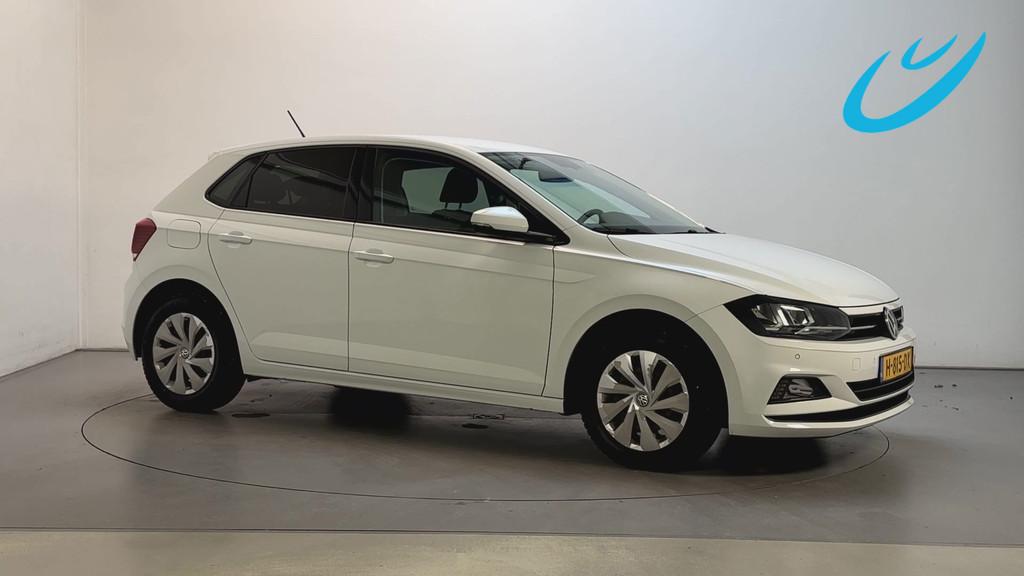 Volkswagen Polo 1.0 TSI Comfortline Parkeersensoren Navigati, Auto's, Voorwielaandrijving, Stof, Gebruikt, 95 pk