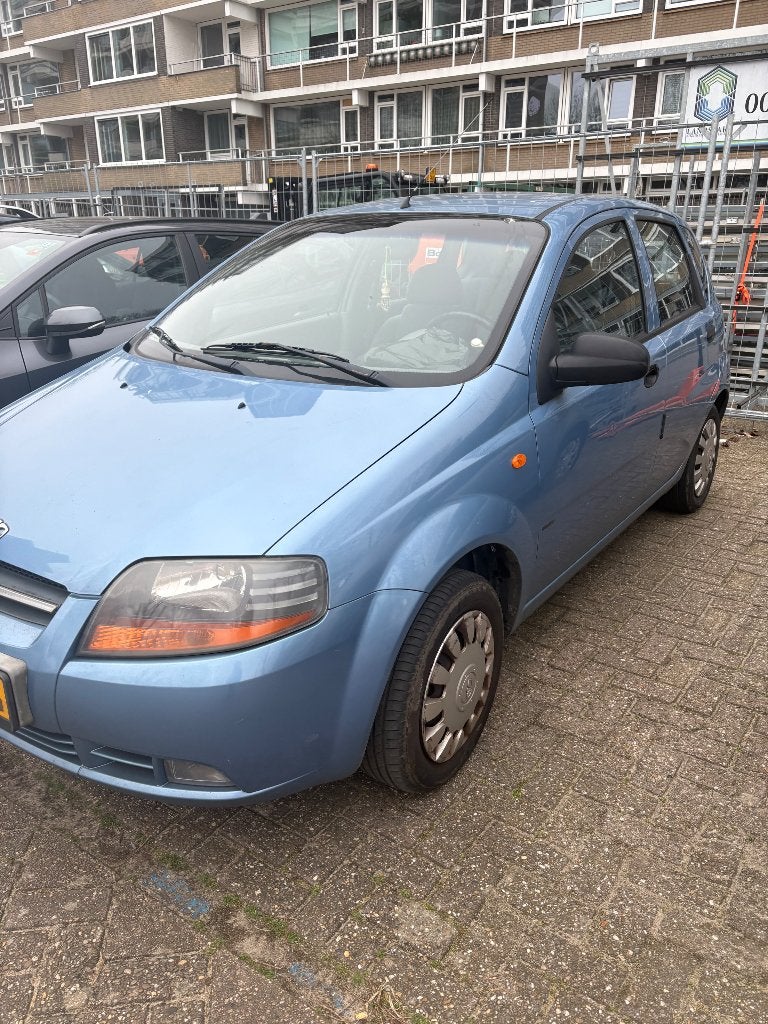 Daewoo Kalos 1.4 2003 Blauw, Auto's, Daewoo, Stof, 40 €/maand, 4 cilinders, Origineel Nederlands