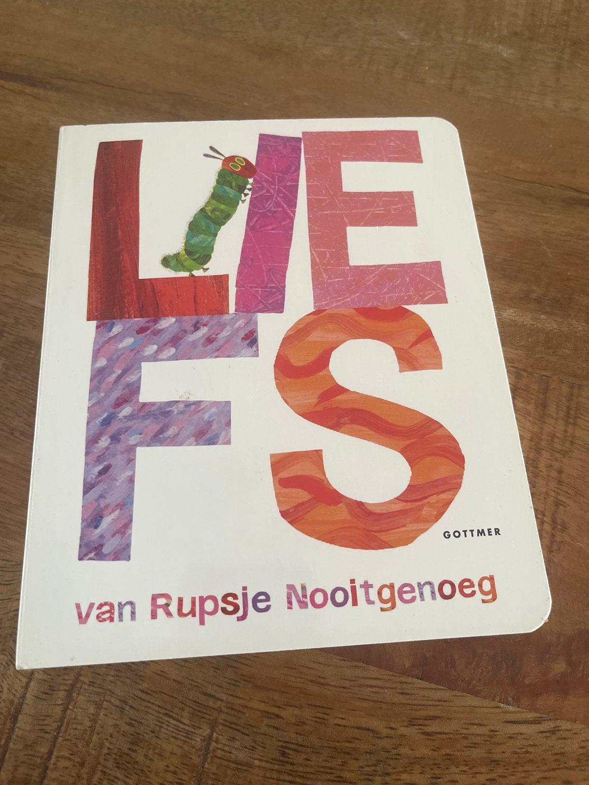 Liefs van Rupsje Nooitgenoeg - Eric Carle, Ophalen of Verzenden, Zo goed als nieuw, 0 tot 6 maanden