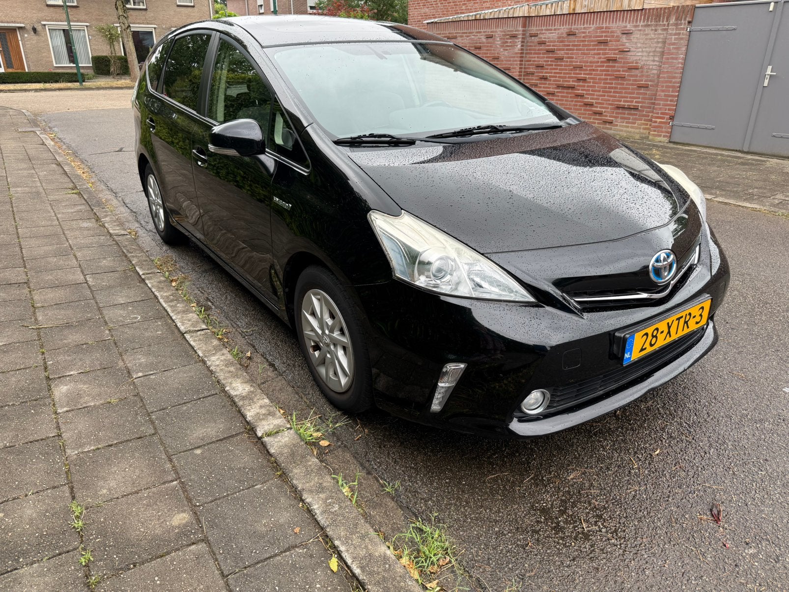 Toyota Prius Wagon 1.8 Full Hybrid 136PK Aut 96g 2012 Zwart, Auto's, Toyota, Zwart, 4 cilinders, 7 stoelen, Zwart