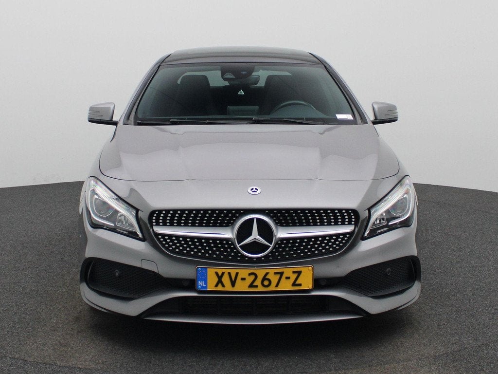 Mercedes-Benz CLA-klasse 180 AUTOMAAT | PANORAMADAK | AMG EX, Auto's, Mercedes-Benz, Gebruikt, 4 cilinders, Leder en Stof, 122 pk
