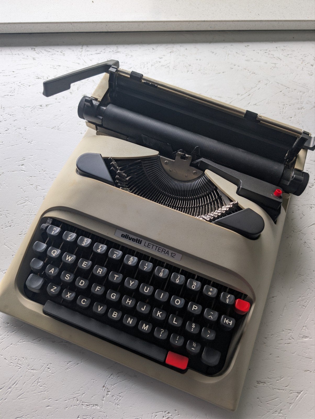 Olivetti Lettera 12 draagbare typemachine, Ophalen, Gebruikt