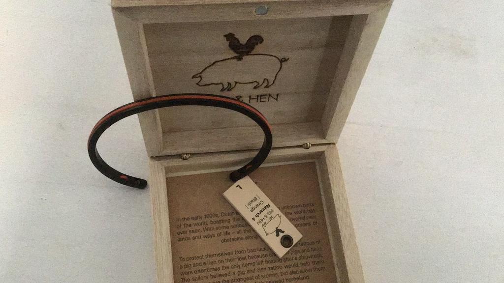 Pig & Hen setje Tijdloos, Sieraden, Tassen en Uiterlijk, Armbanden, Ophalen of Verzenden, Zo goed als nieuw, Oranje