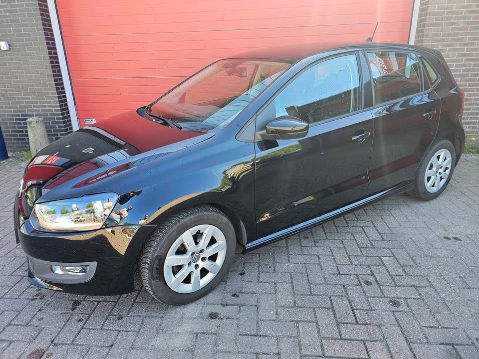 Volkswagen Polo 1.2 TDI 55KW BM 2012 Zwart, Auto's, Volkswagen, Voorwielaandrijving, Euro 5, Stof, 74 pk