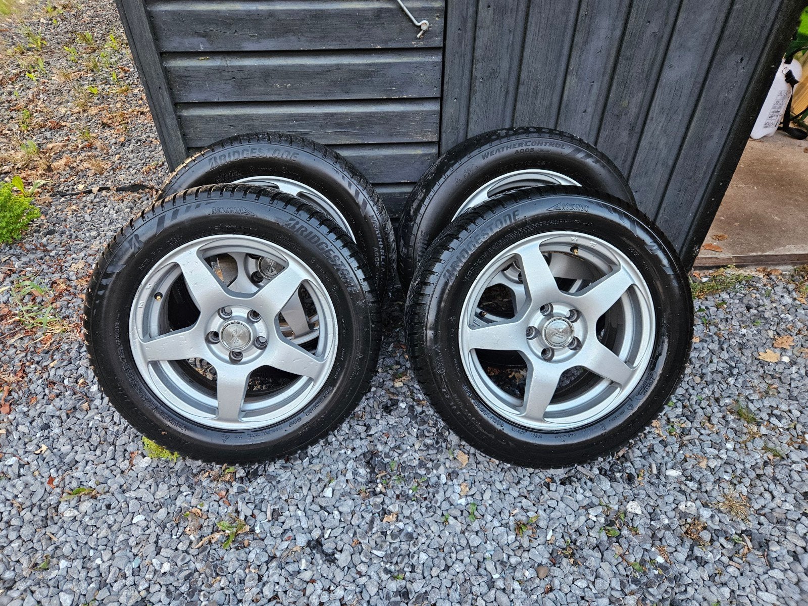 15 inch velgen met Bridgestone all-season banden 5x100, Ophalen, Gebruikt, 15 inch, Banden en Velgen
