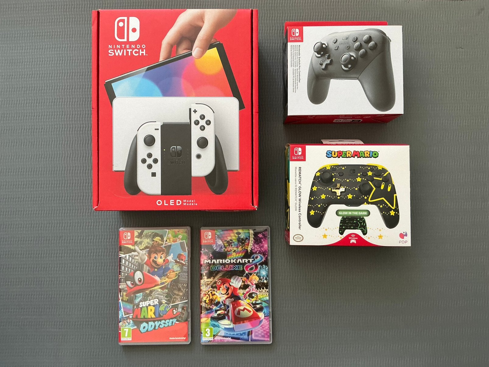 NINTENDO SWITCH 64GB OLED TE KOOP, Switch OLED, Met games, Met 2 controllers, Ophalen of Verzenden