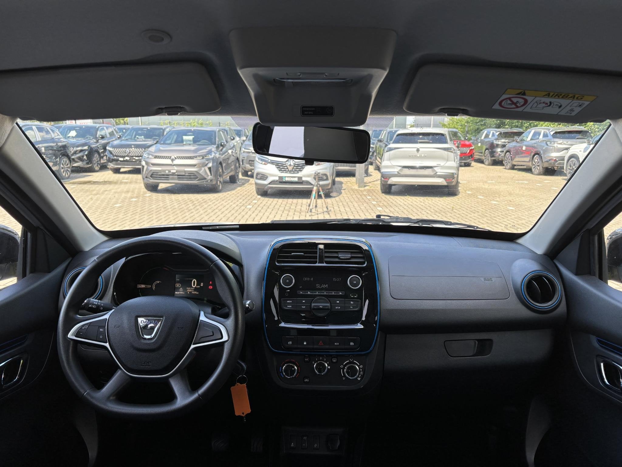 Dacia Spring Comfort 27 kWh | 1e Eigenaar | Airco |, Auto's, Dacia, Gebruikt, 38 min, Leder en Stof, Wit