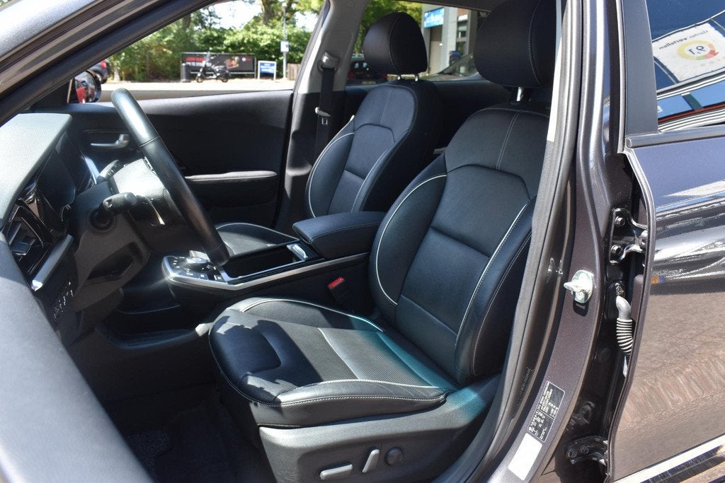 Kia Niro EV ExecutiveLine 64.8 kWh JBL | BSM | Leder | Stoel, Auto's, Kia, Gebruikt, 1657 kg, 420 min, Lichtsensor