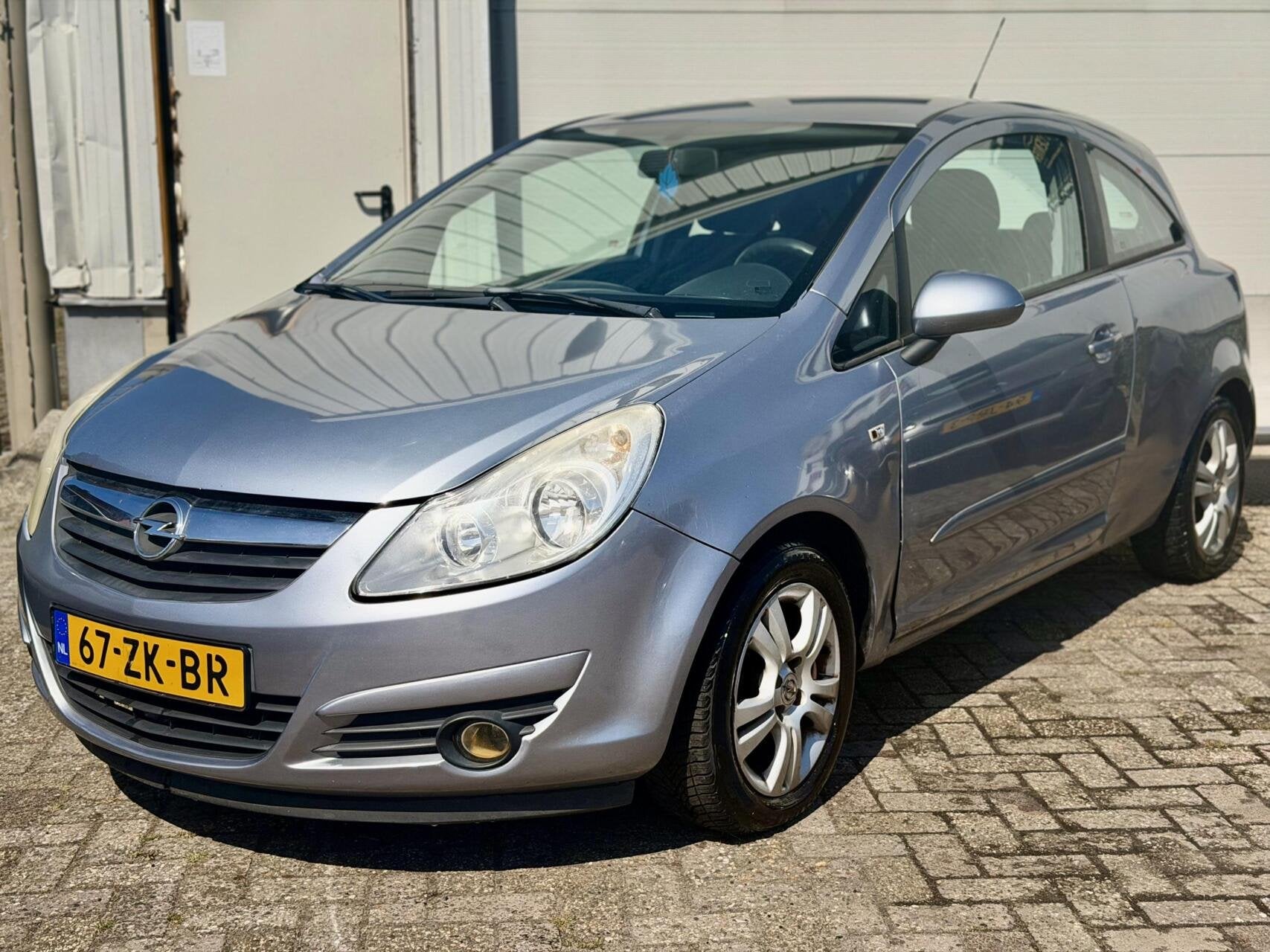 Opel Corsa 1.4-16V Enjoy, Auto's, Opel, Voorwielaandrijving, 4 cilinders, Origineel Nederlands, Bedrijf