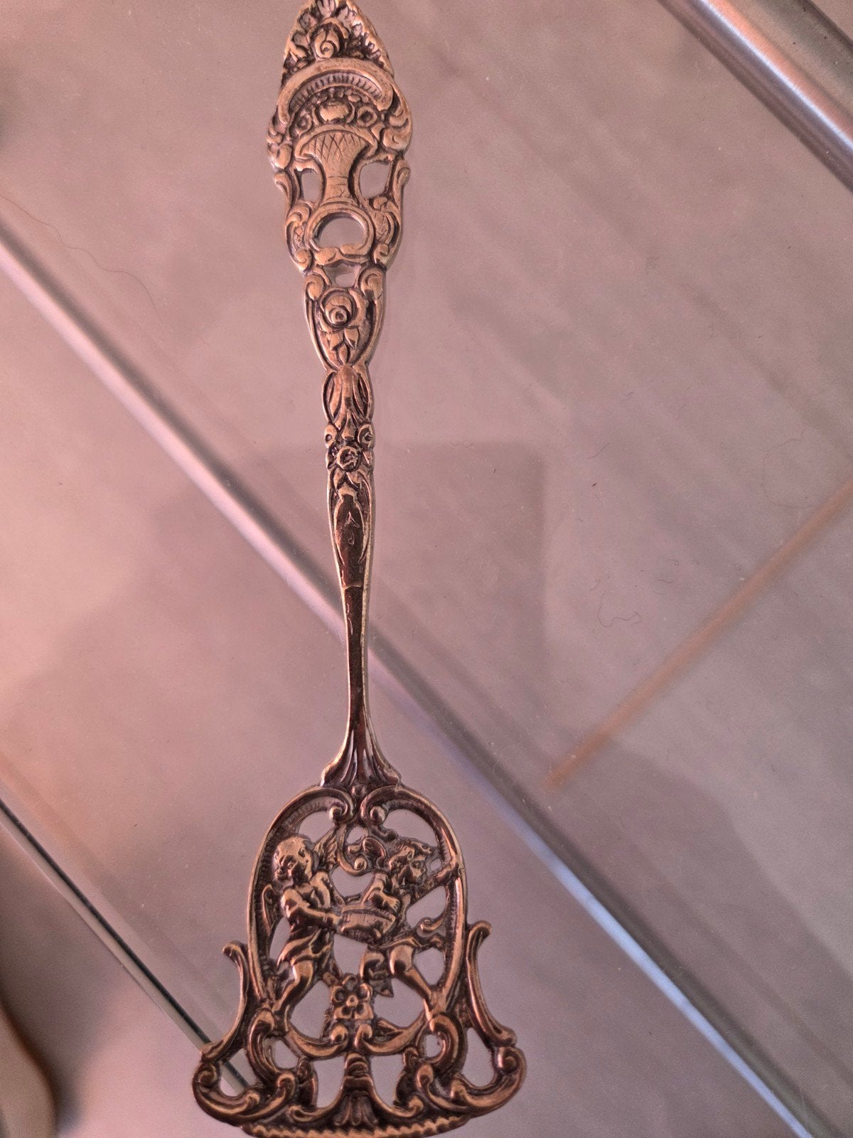 Antieke lepel met cherubijnen en sierlijke details, Ophalen of Verzenden