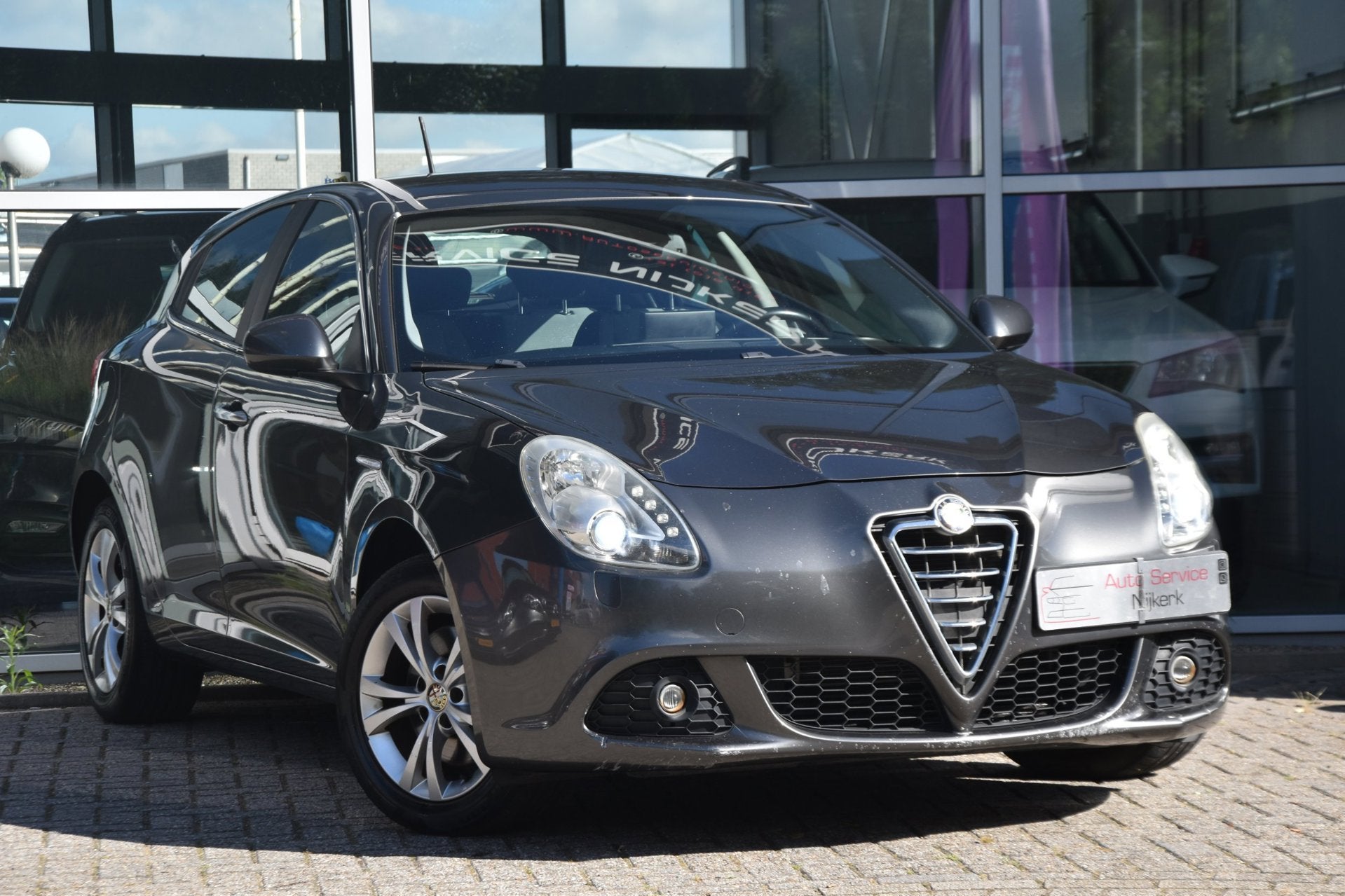 Alfa Romeo Giulietta 1.4 T Distinctive | Navi | Xenon | PDC, Voorwielaandrijving, Euro 5, Stof, Gebruikt